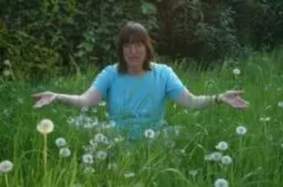 Cllr Caroline Nichols with uncut grass