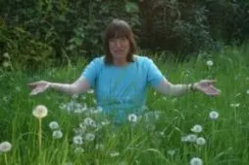 Cllr Caroline Nichols with uncut grass