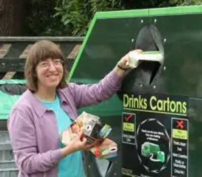 Cllr Caroline Nichols recycling her cartons at the Avenue car park in Sunbury